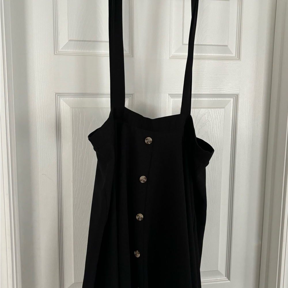 Skirt with straps aka overall dress.